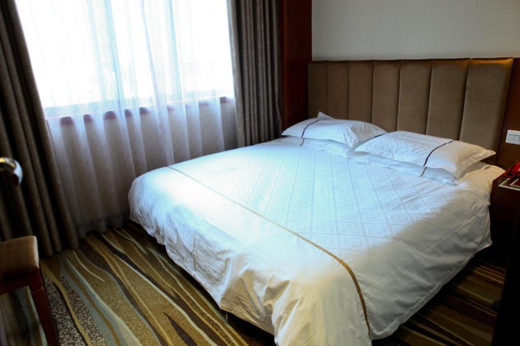 Kaifu Hotel Kuangcsou Szoba fotó